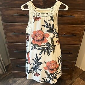 White open back dress with flower detail